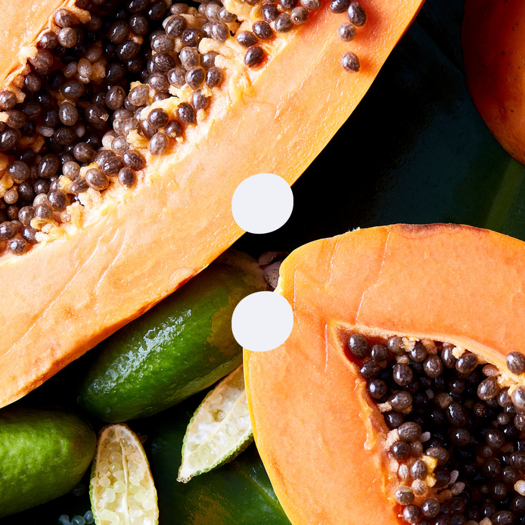 A close-up of Papaya & Finger Lime fruit with an Earthen logo in the middle on Spa Circle Brands product listing page.