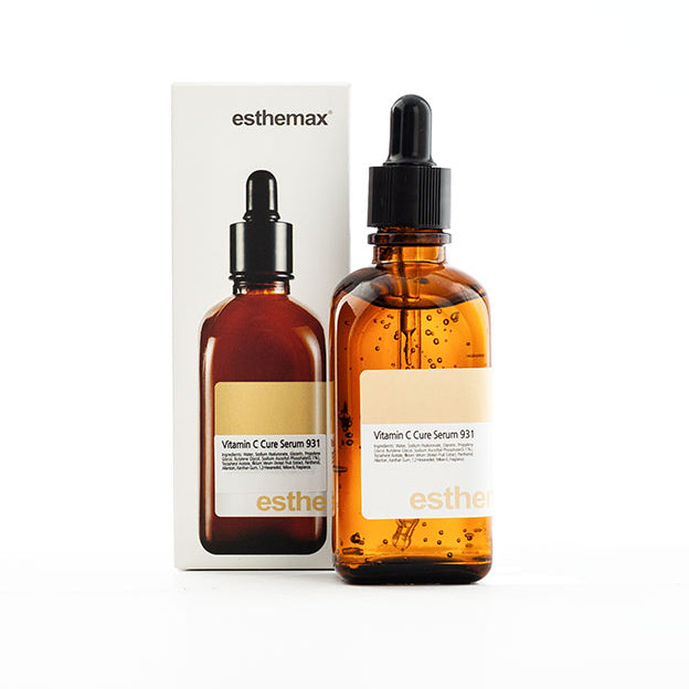 Esthemax Vitamin C Cure Serum 100ml dropper bottle and box packaging on a white background uploaded on Spa Circle Brands product listing page.