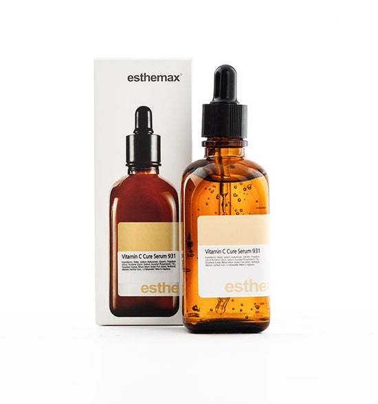 Esthemax Vitamin C Cure Serum 100ml dropper bottle and box packaging on a white background uploaded on Spa Circle Brands product listing page.