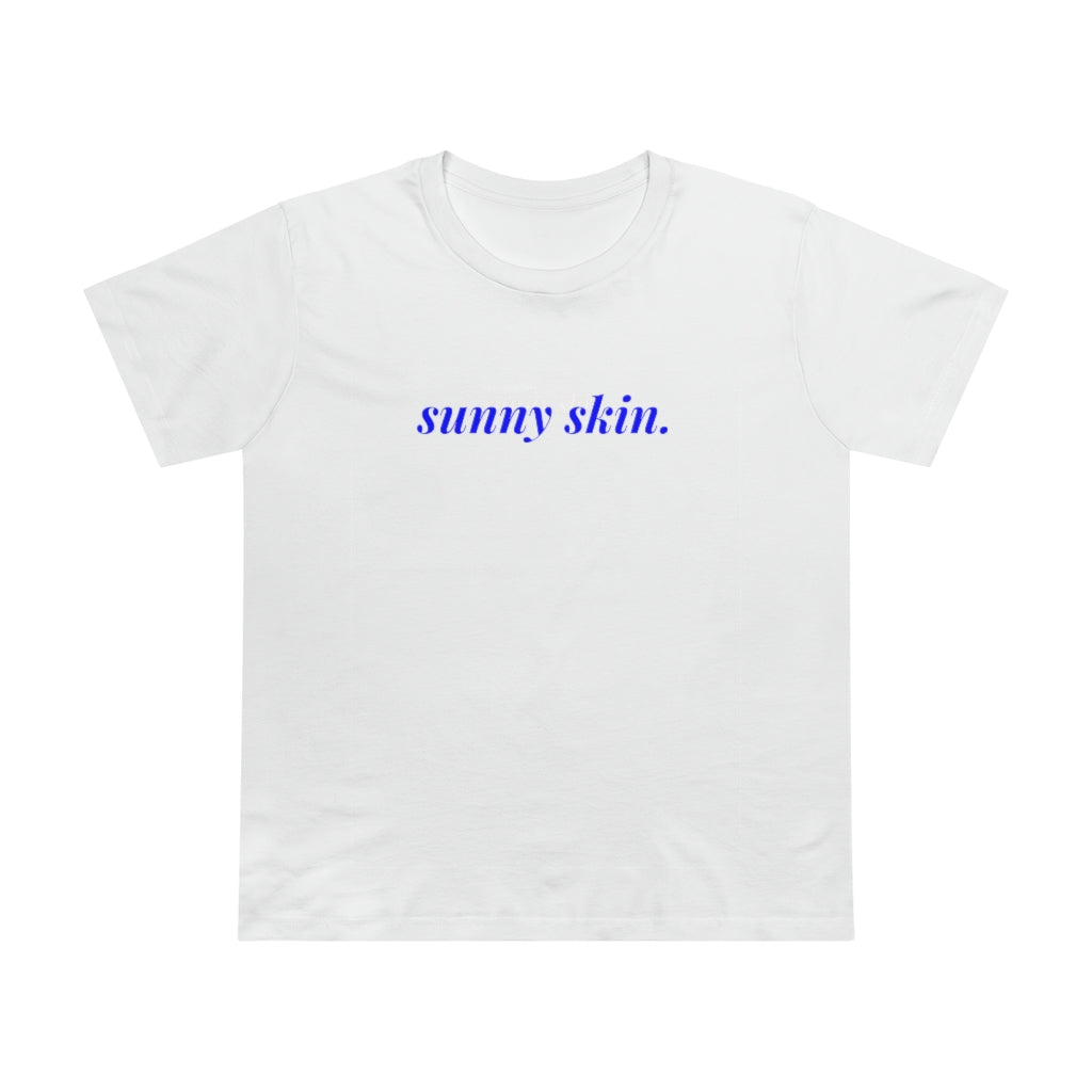 A white t-shirt with a sunny skin design on it, on Spa Circle Brands product listing page.