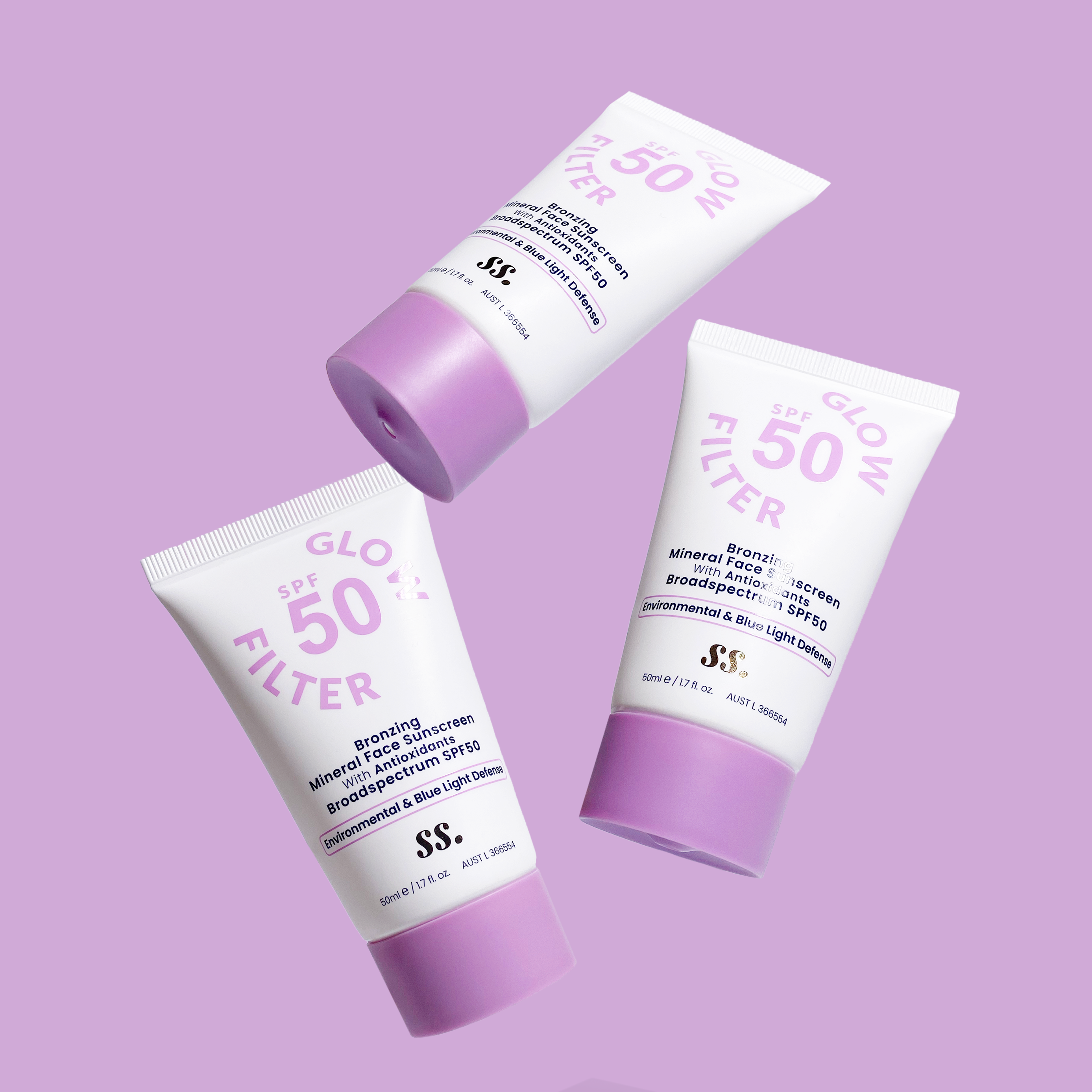 Three tubes of Sunny Skin Glow Filter SPF50 on violet background uploaded on Spa Circle Brands product listing page.