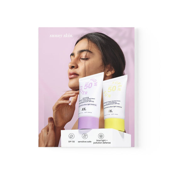 An advertisement poster featuring a woman's face with two bottles of Sunny Skin Mineral Sunscreens on Spa Circle Brands product listing page.