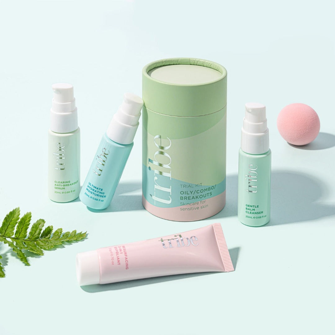 Innovative layout: Tribe Trial/Travel Kit OILY/COMBO/BREAKOUTS  on calming green pastel backdrop. On Spa Circle Brands' listing, hinting at kit's potential.