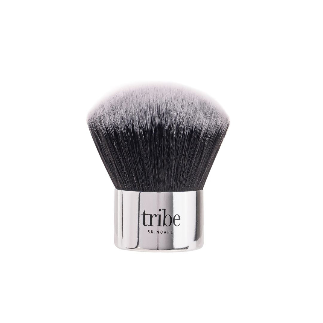 A clear photo of Tribe Mineral Makeup Brush on white background, featured on Spa Circle Brands' product listing