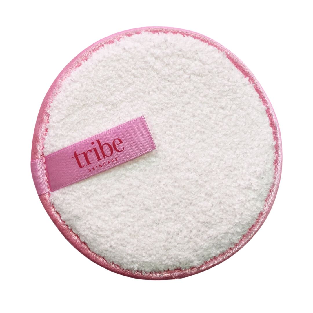 A photo of Tribe Makeup Removal Mitt on white background, featured on Spa Circle Brands' product listing.