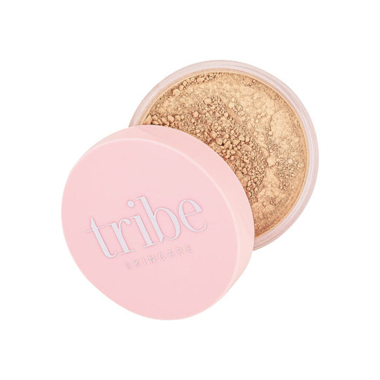 A professional image of Tribe Mineral Makeup Powder LIGHT/MEDIUM 15g on a white background, featured on Spa Circle Brands' product listing.