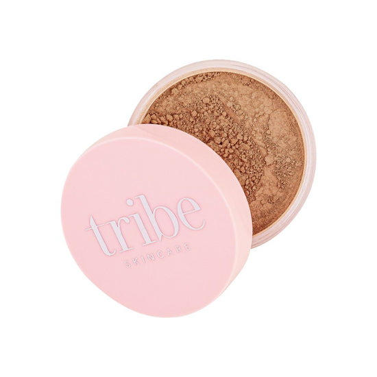 A professional image of Tribe Mineral Makeup Powder TAN 15g on a white background, featured on Spa Circle Brands' product listing.